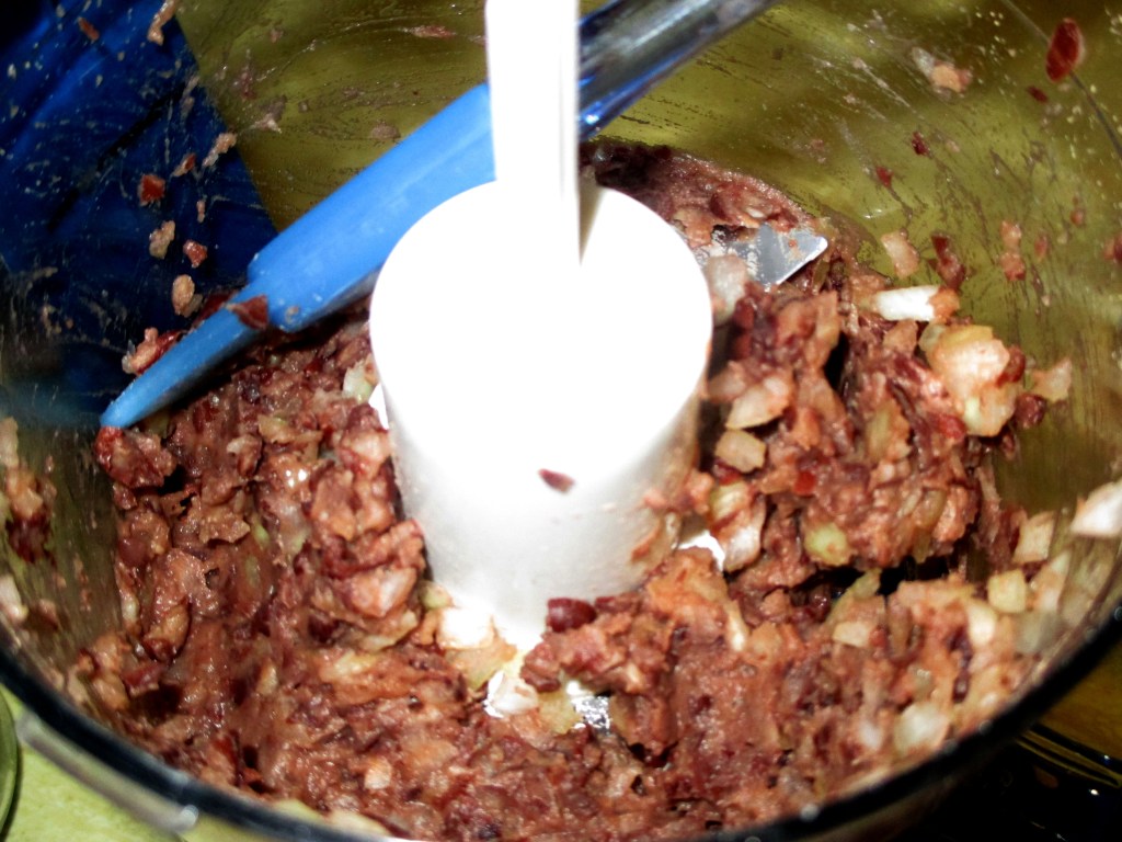 Black beans and onions in food processor.